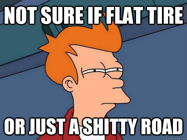 not sure if flat tire or just a shitty road  Futurama Fry