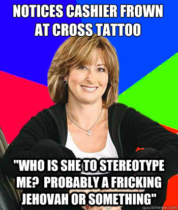 NOTICES CASHIER FROWN AT CROSS TATTOO 