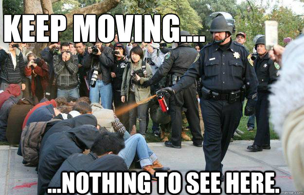 Keep moving.... ...nothing to see here.  Pimp Pepper Spray Cop