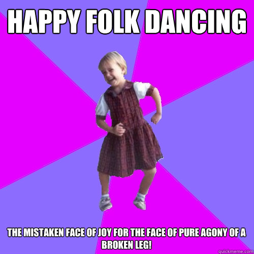 happy Folk dancing the mistaken face of joy for the face of pure agony of a broken leg!  Socially awesome kindergartener