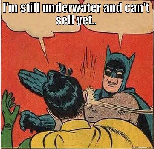 I'M STILL UNDERWATER AND CAN'T SELL YET..  Batman Slapping Robin