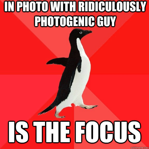 In photo with ridiculously photogenic guy Is the Focus  Socially Awesome Penguin