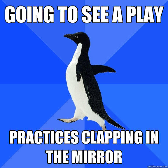 going to see a play practices clapping in the mirror  