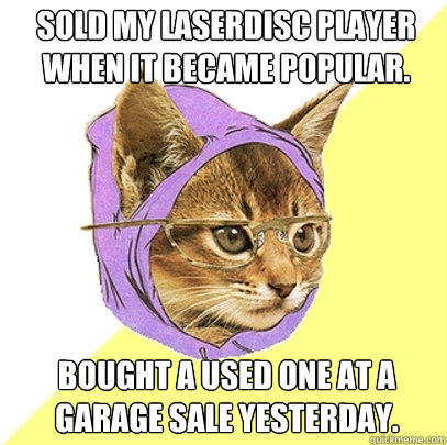 Sold my laserdisc player when it became popular. bought a used one at a garage sale yesterday. - Sold my laserdisc player when it became popular. bought a used one at a garage sale yesterday.  Hipster Kitty