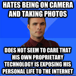 Hates being on camera and taking photos does not seem to care that his own proprietary technology is exposing his personal life to the internet  Socially Awkward Darcy