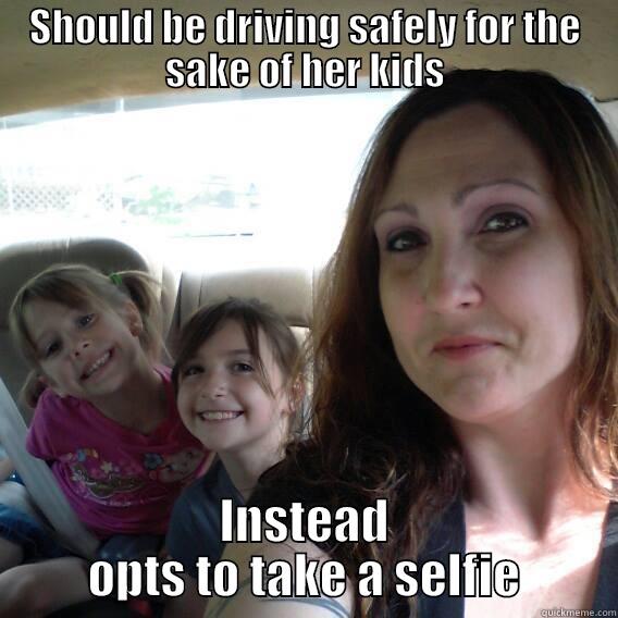 SHOULD BE DRIVING SAFELY FOR THE SAKE OF HER KIDS INSTEAD OPTS TO TAKE A SELFIE Misc