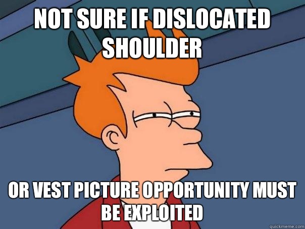 Not sure if dislocated shoulder Or vest picture opportunity must be exploited - Not sure if dislocated shoulder Or vest picture opportunity must be exploited  Futurama Fry