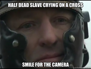 Half dead slave crying on a cross Smile for the camera  Happy Crassus