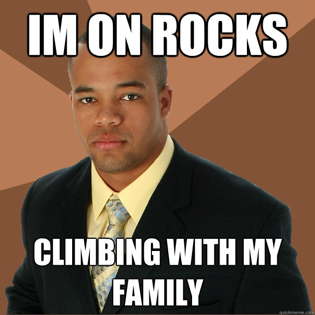 Im on rocks Climbing with my family  Successful Black Man