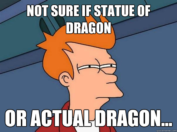 Not sure if statue of dragon Or actual dragon...  Futurama Fry