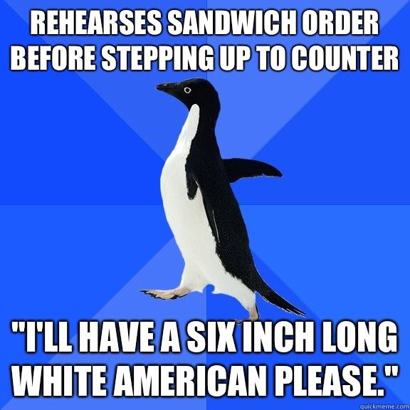 Rehearses sandwich order before stepping up to counter 