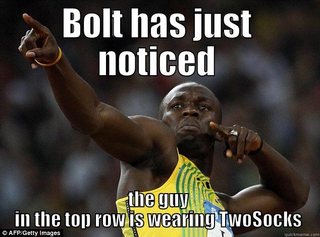 BOLT HAS JUST NOTICED THE GUY IN THE TOP ROW IS WEARING TWOSOCKS Misc