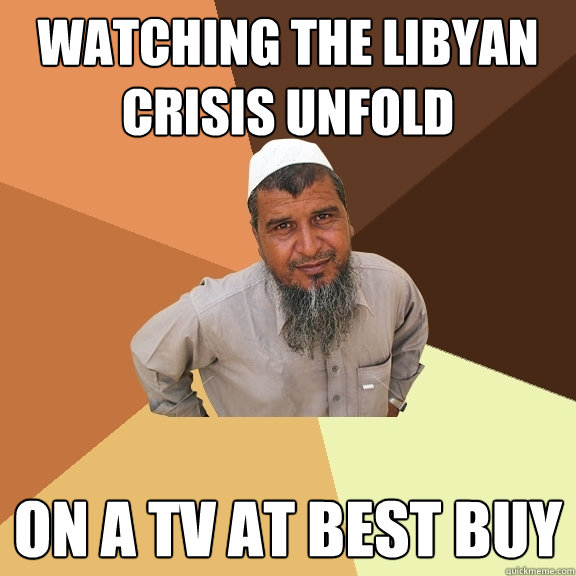 Watching the Libyan Crisis Unfold On a TV at Best Buy  - Watching the Libyan Crisis Unfold On a TV at Best Buy   Ordinary Muslim Man