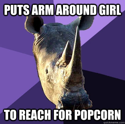 Puts arm around girl to reach for popcorn  Sexually Oblivious Rhino