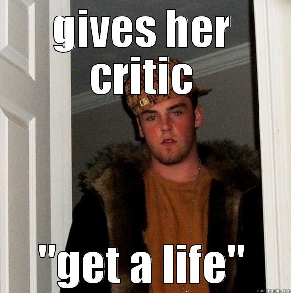 GIVES HER CRITIC 