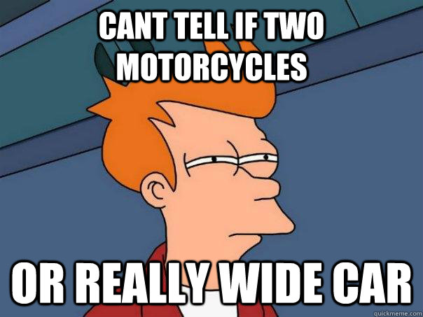 Cant tell if two motorcycles  or really wide car  Futurama Fry