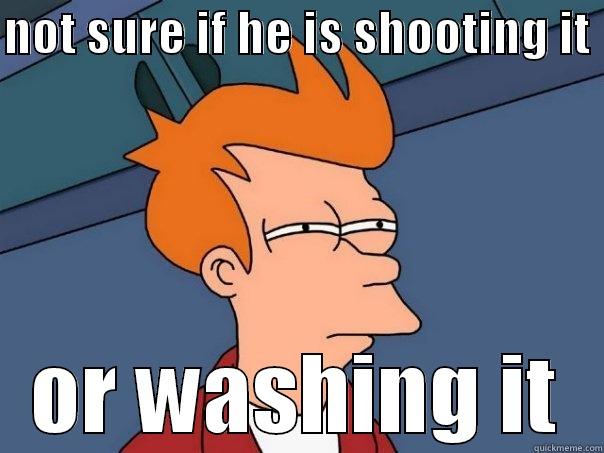 NOT SURE IF HE IS SHOOTING IT  OR WASHING IT Futurama Fry