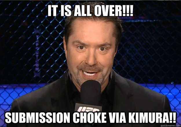 It is all over!!! Submission Choke via Kimura!!  Mike Goldberg