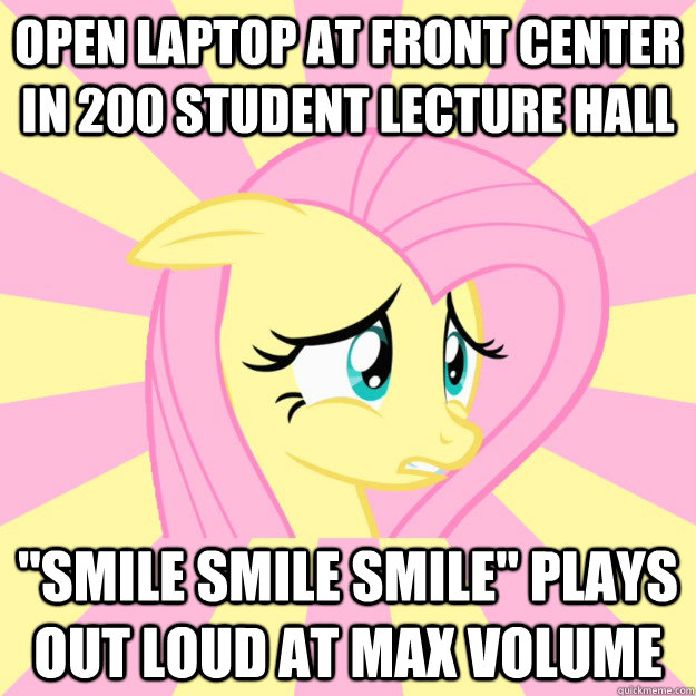 Open laptop at front center in 200 student lecture hall  