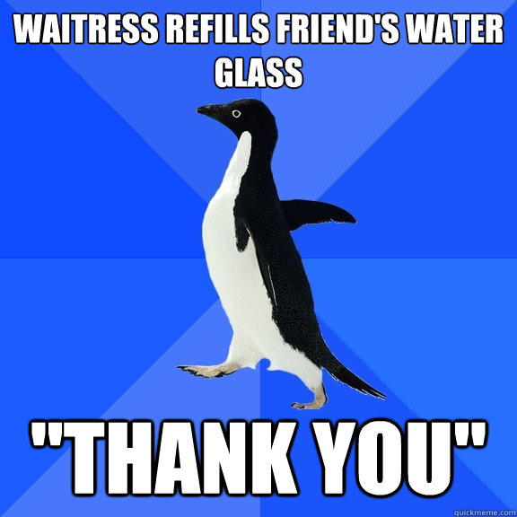 Waitress refills friend's water glass 