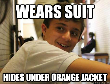 wears suit hides under orange jacket  