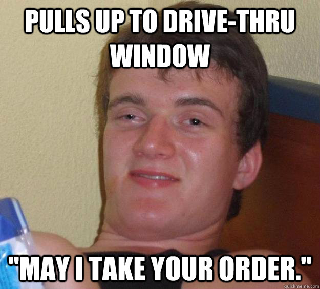 pulls up to drive-thru window 