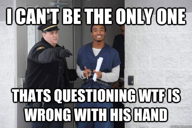 I can't be the only one thats questioning wtf is wrong with his hand  Ridiculously Photogenic Prisoner