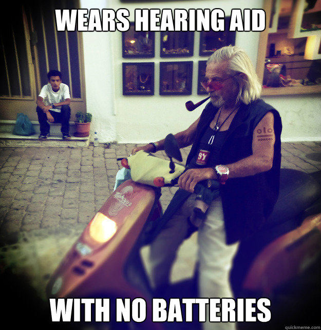 WEARS HEARING AID WITH NO BATTERIES  