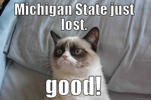 MICHIGAN STATE JUST LOST. GOOD! Grumpy Cat