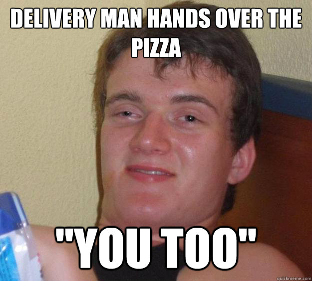 Delivery man hands over the pizza 