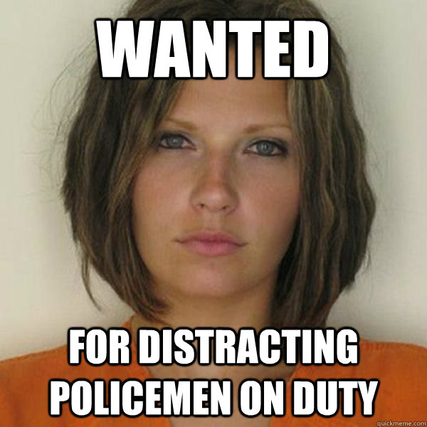 wanted
 for distracting policemen on duty  Attractive Convict