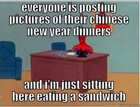 EVERYONE IS POSTING PICTURES OF THEIR CHINESE NEW YEAR DINNERS AND I'M JUST SITTING HERE EATING A SANDWICH Spiderman Desk