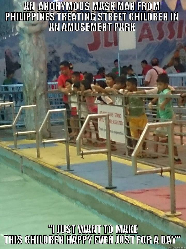 a stolen shot of a good samaritan - AN  ANONYMOUS MASK MAN FROM PHILIPPINES TREATING STREET CHILDREN IN AN AMUSEMENT PARK  