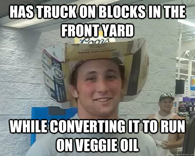 has truck on blocks in the front yard while converting it to run on veggie oil  