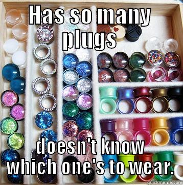 HAS SO MANY PLUGS DOESN'T KNOW WHICH ONE'S TO WEAR. Misc