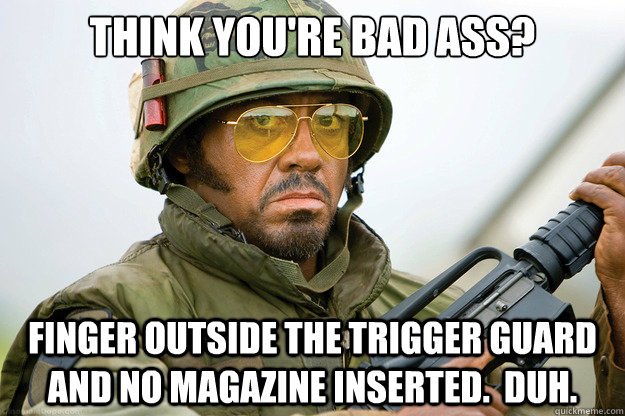 think you're bad ass? finger outside the trigger guard and no magazine inserted.  Duh.  