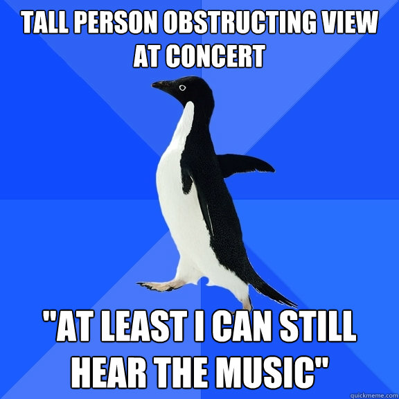 Tall person obstructing view at concert 