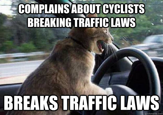 Complains about cyclists breaking traffic laws breaks traffic laws  