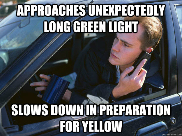 approaches unexpectedly long green light Slows down in preparation for yellow - approaches unexpectedly long green light Slows down in preparation for yellow  Idiot Driver