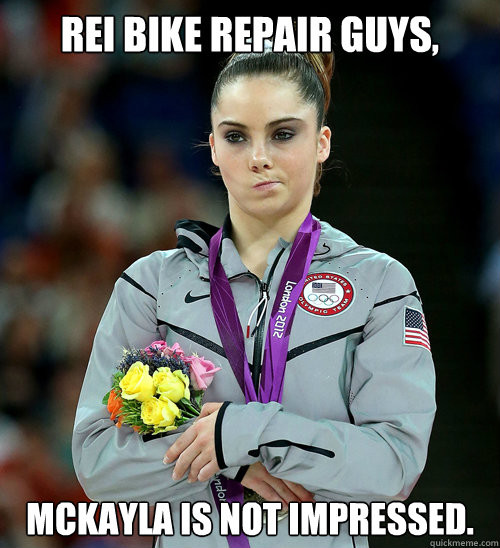 REI Bike Repair Guys, McKayla is not impressed.  McKayla Not Impressed