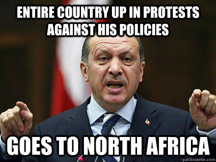 entire country up in protests against his policies goes to north africa  