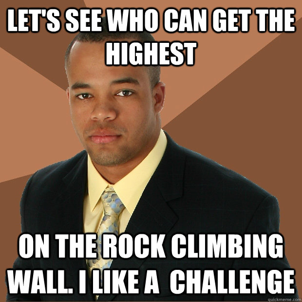 Let's see who can get the highest on the rock climbing wall. I like a  challenge  Successful Black Man