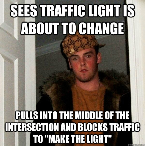 Sees traffic light is about to change pulls into the middle of the intersection and blocks traffic to 