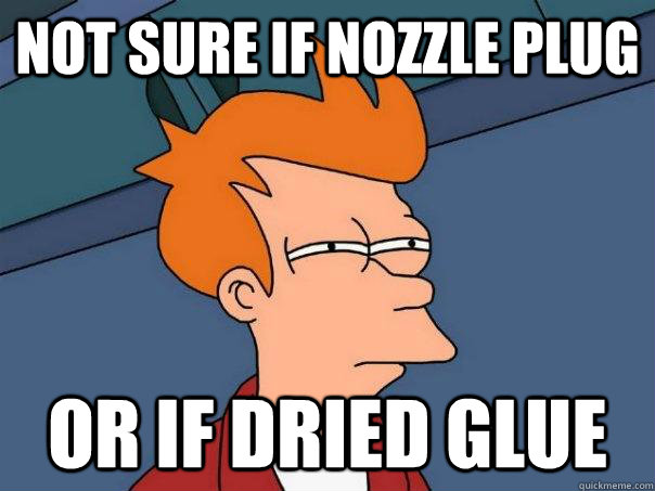 Not sure if nozzle plug or if dried glue  Futurama Fry