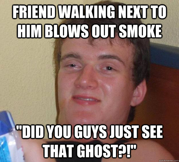 Friend walking next to him blows out smoke 