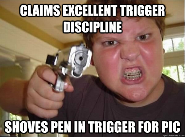 Claims excellent trigger discipline Shoves pen in trigger for pic - Claims excellent trigger discipline Shoves pen in trigger for pic  Most of us