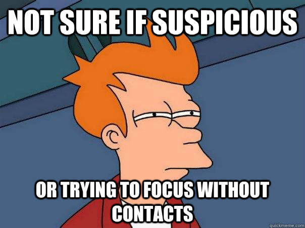 not sure if suspicious or trying to focus without contacts  Futurama Fry