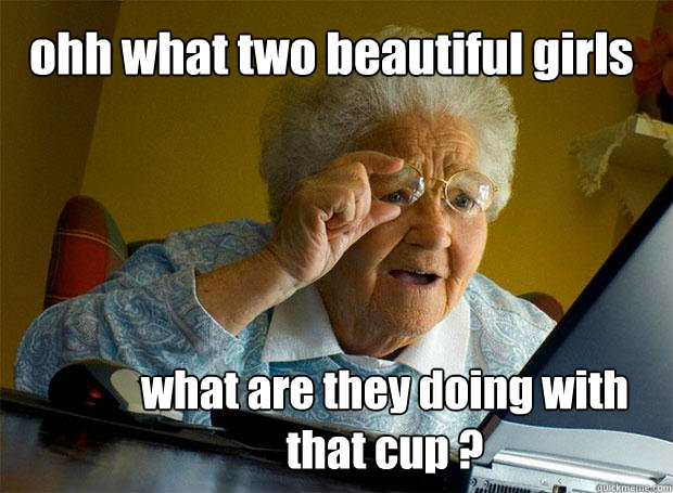 ohh what two beautiful girls  what are they doing with that cup ?  Grandma finds the Internet